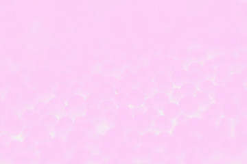 Pastel pink and white abstract background with balls pattern