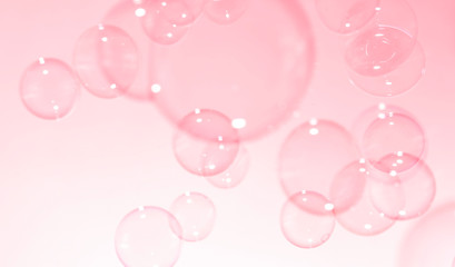 Beautiful pink soap bubbles float in the air, bubbles background