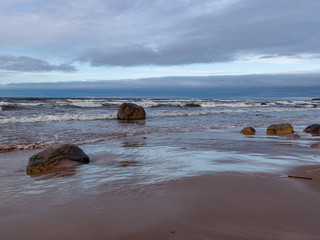 Fototapeta premium beautiful seascape, dark clouds and white waves