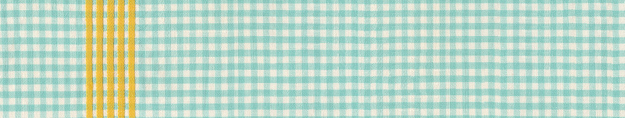 background green gingham kitchen towel withyellow stripe. Banner background