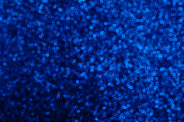 Abstract background with blurred bokeh in blue.