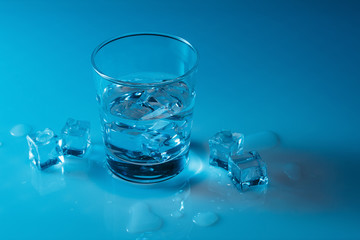 A glass of clean water with ice cubes. Concept.Copy space.
