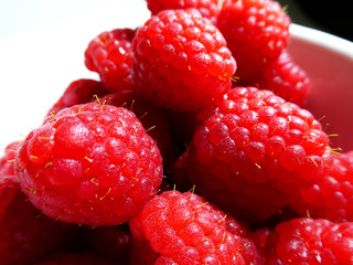Close-up look of fresh raspberries in a bowl