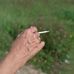 Woman smoking outdoor