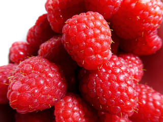 Close-up look of fresh raspberries in a bowl