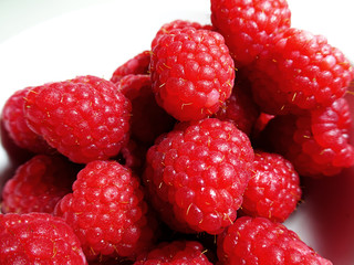 Close-up look of fresh raspberries in a bowl