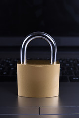 Padlock on computer keyboard. Internet data privacy information security concept.