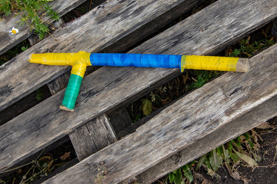 homemade rubber baton guard made of wood