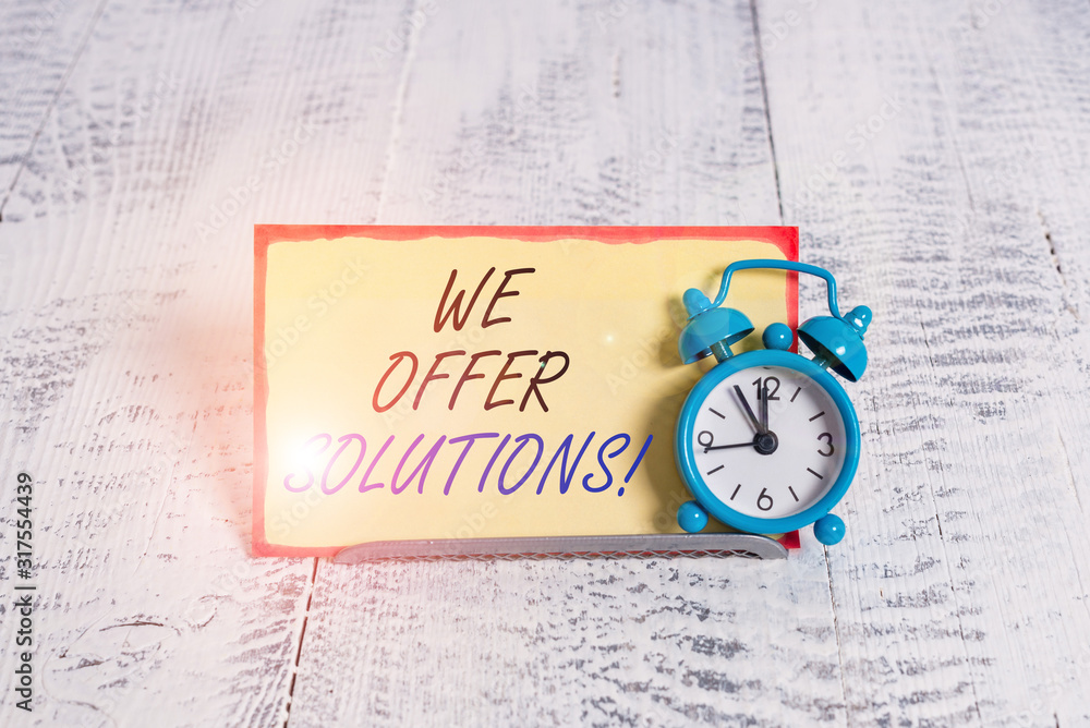 Poster writing note showing we offer solutions. business concept for offering help assistance experts advic