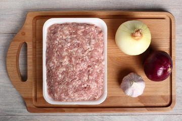 Ground chicken in polystyrene food tray