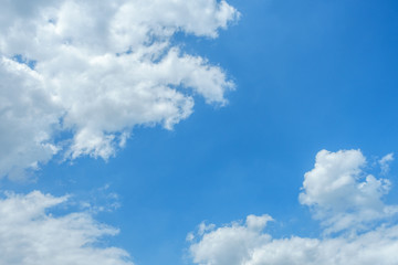 Naklejka na ściany i meble Blue sky with white clouds in daylight for background.