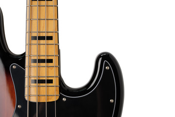 Close Up to neck and body part of Sunburst 4 string jazz bass guitar isolated on white background.
