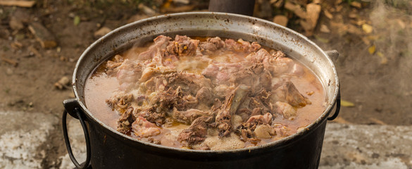 Kavurma is a Turkic sheep meat dish. Pieces of meat are stewed in a large cauldron over an open fire.