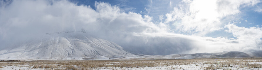 Snowy landscape in a winter day in Castelluccio, Norcia, Umbria, Italia