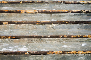 Rusty staircase. Rusty metal. Stripes of rusty iron. Texture