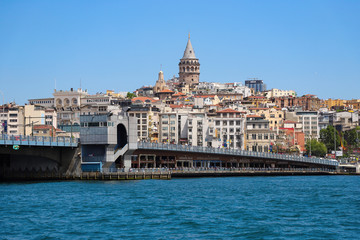 Fototapeta premium Golden horn Bay, Galata bridge in Istanbul, Galata tower in the background. Turkey, Istanbul, may 2019