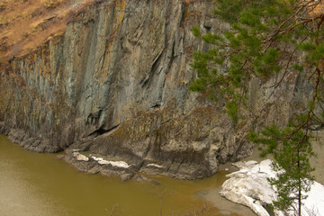 green mountain river near the cliff