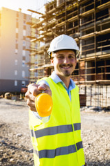 construction industy worker posing with pendant helmet