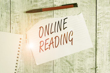 Writing note showing Online Reading. Business concept for process of extracting meaning is in a...