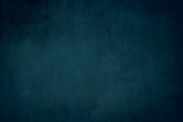 Obraz na płótnie Canvas dark grungy blue background or texture