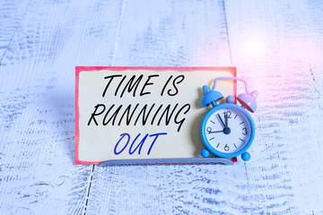 Writing note showing Time Is Running Out. Business concept for Deadline is approaching Urgency...