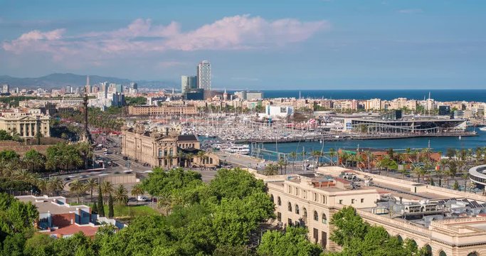 Elevated view over Port Vell - the old harbour district in Barcelona, Spain - Time lapse
