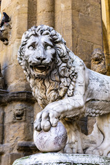 Florence lion statue at the Loggia dei Lanzi in Florence, Italy