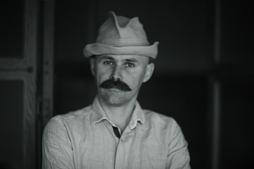 Fototapeta na wymiar vintage style, portrait of a man with a large mustache, unusual gentleman