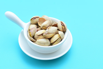 Pistachios in colorful and natural backgrounds