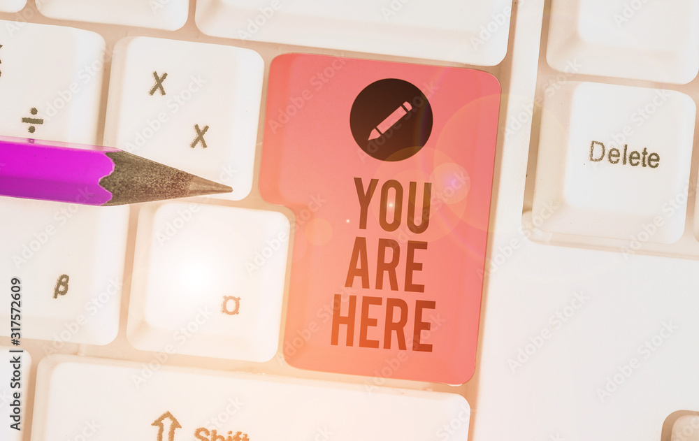 Poster conceptual hand writing showing you are here. concept meaning this is your location reference point 