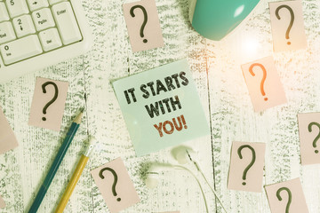 Conceptual hand writing showing It Starts With You. Concept meaning Motivation for starting doing...