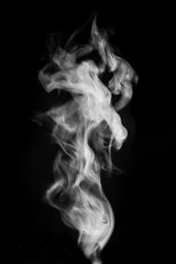Smoke or steam on black isolated background for insertion image in overlay mode_