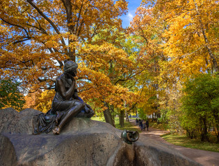 statue of a girl and a pitcher in the Park autumn Pushkin St. Petersburg