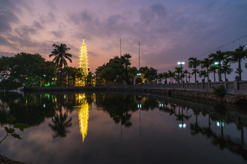 Fototapeta na wymiar View of Tran Quoc Pagoda in Hanoi in the evening, Vietnam