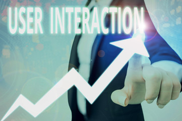 Conceptual hand writing showing User Interaction. Concept meaning the conduit between huanalysis and computer interaction