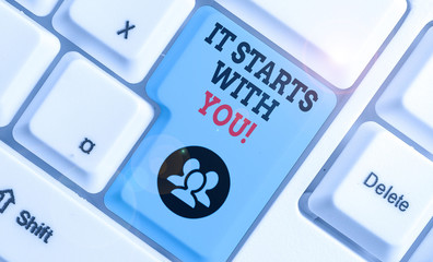 Text sign showing It Starts With You. Business photo showcasing Motivation for starting doing...