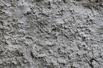 Background concrete texture. The wall of an unfinished building.