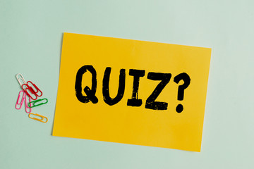 Word writing text Quiz Question. Business photo showcasing test of knowledge as competition between individuals or teams Plain cardboard and writing equipment placed above pastel colour backdrop