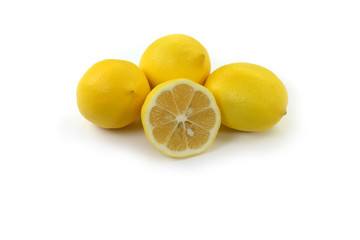 Heap of lemon. Juicy yellow slice of lemon on a white background isolated. Cut lemon fruits isolated on white background.