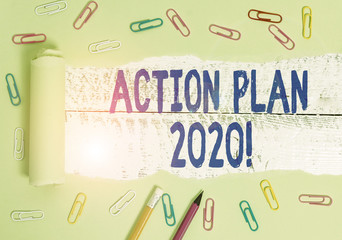 Handwriting text writing Action Plan 2020. Conceptual photo proposed strategy or course of actions...