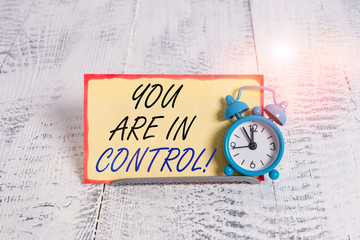 Writing note showing You Are In Control. Business concept for Responsibility over a situation...