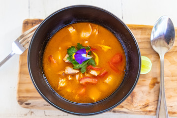 Thai Tom Yam soup with shrimp and shiitake mushrooms top view