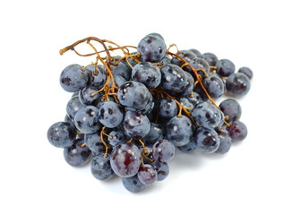 A bunch of overripe grapes isolated on white background.