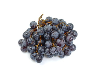 A bunch of overripe grapes isolated on white background.
