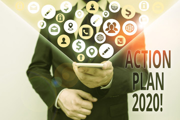 Conceptual hand writing showing Action Plan 2020. Concept meaning proposed strategy or course of...