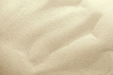 Golden Sand on the beach as background. Sand Texture. Golden sand. Background from fine sand.