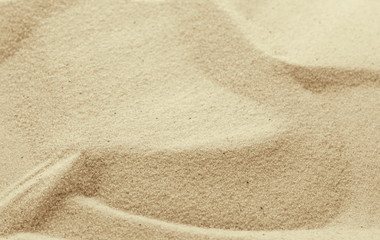 Golden Sand on the beach as background. Sand Texture. Golden sand. Background from fine sand.