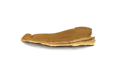 Dried lingzhi mushroom (Also called as Reishi mushroom in Japan, Lingcheu in Thailand, Lingzhi mushroom in China, Ganoderma Lucidum Karst or lacquered mushroom) on white.