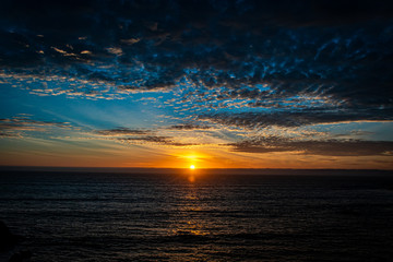 Fototapeta na wymiar Sunset Sky Colors Over the Pacific Ocean