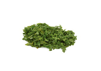 Fototapeta premium chopped fresh celery leaves isolated on white. Aromatic Spice celery leaves.